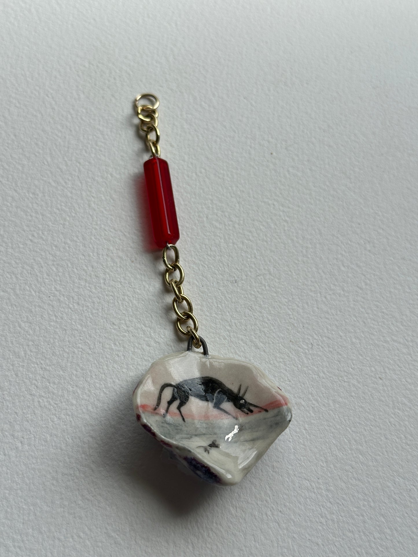 Kin - Shell Charm