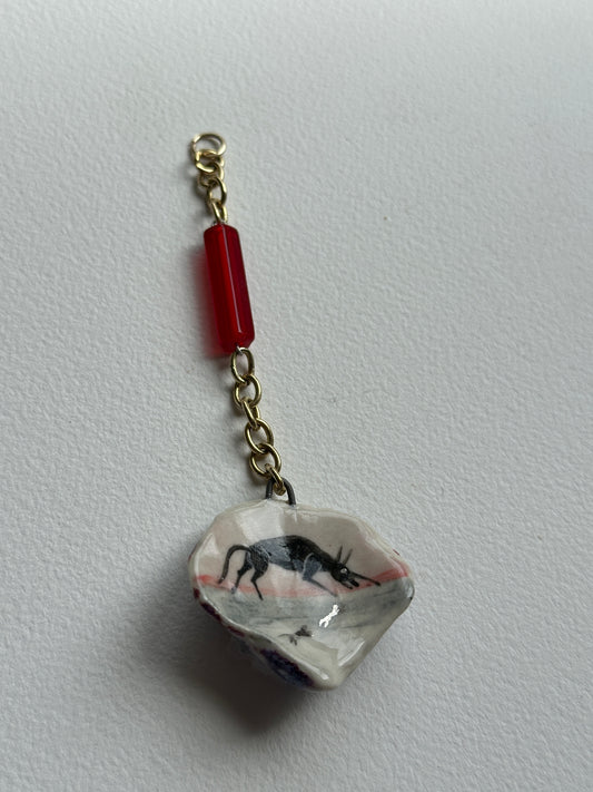 Kin - Shell Charm