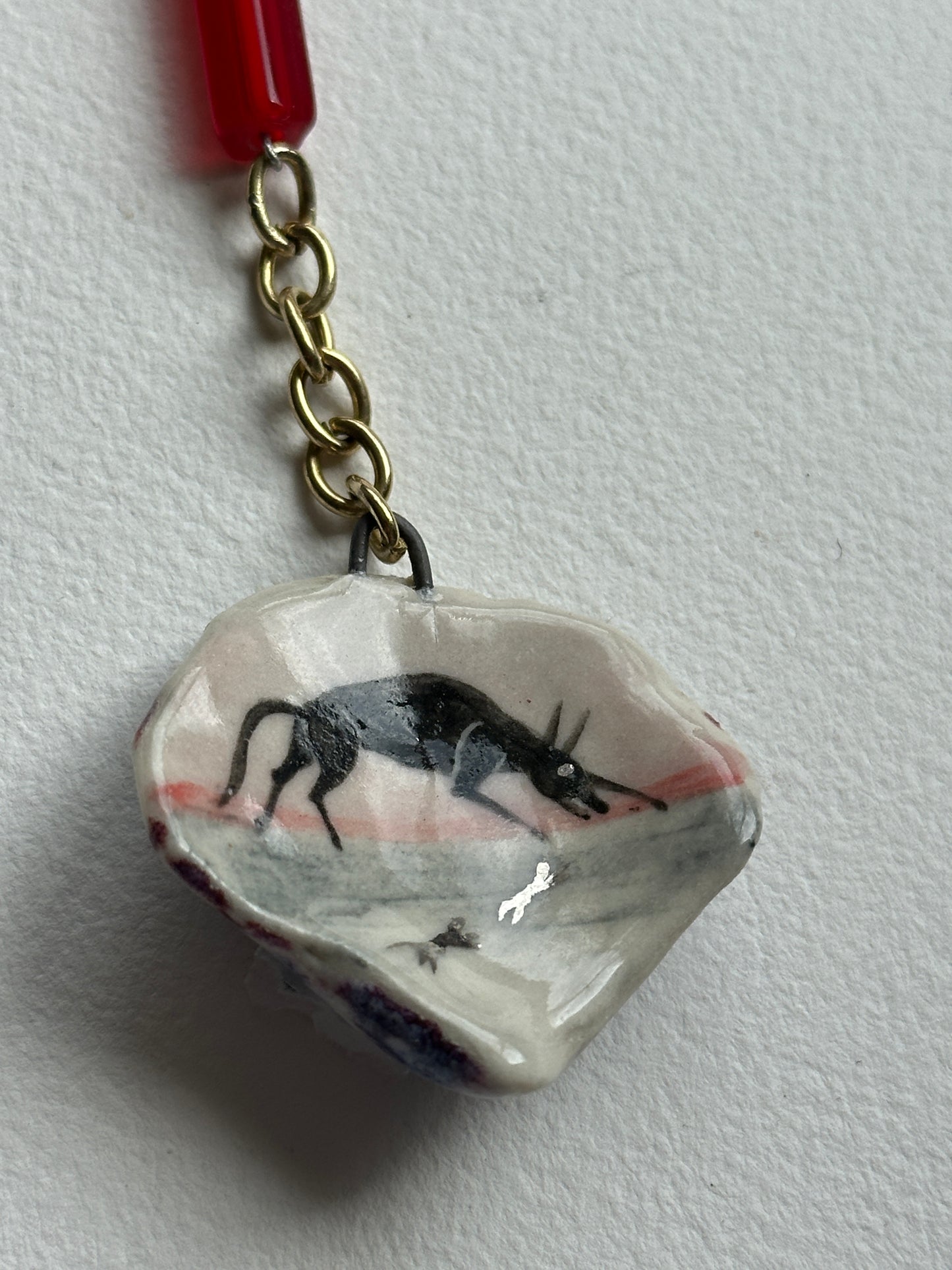 Kin - Shell Charm