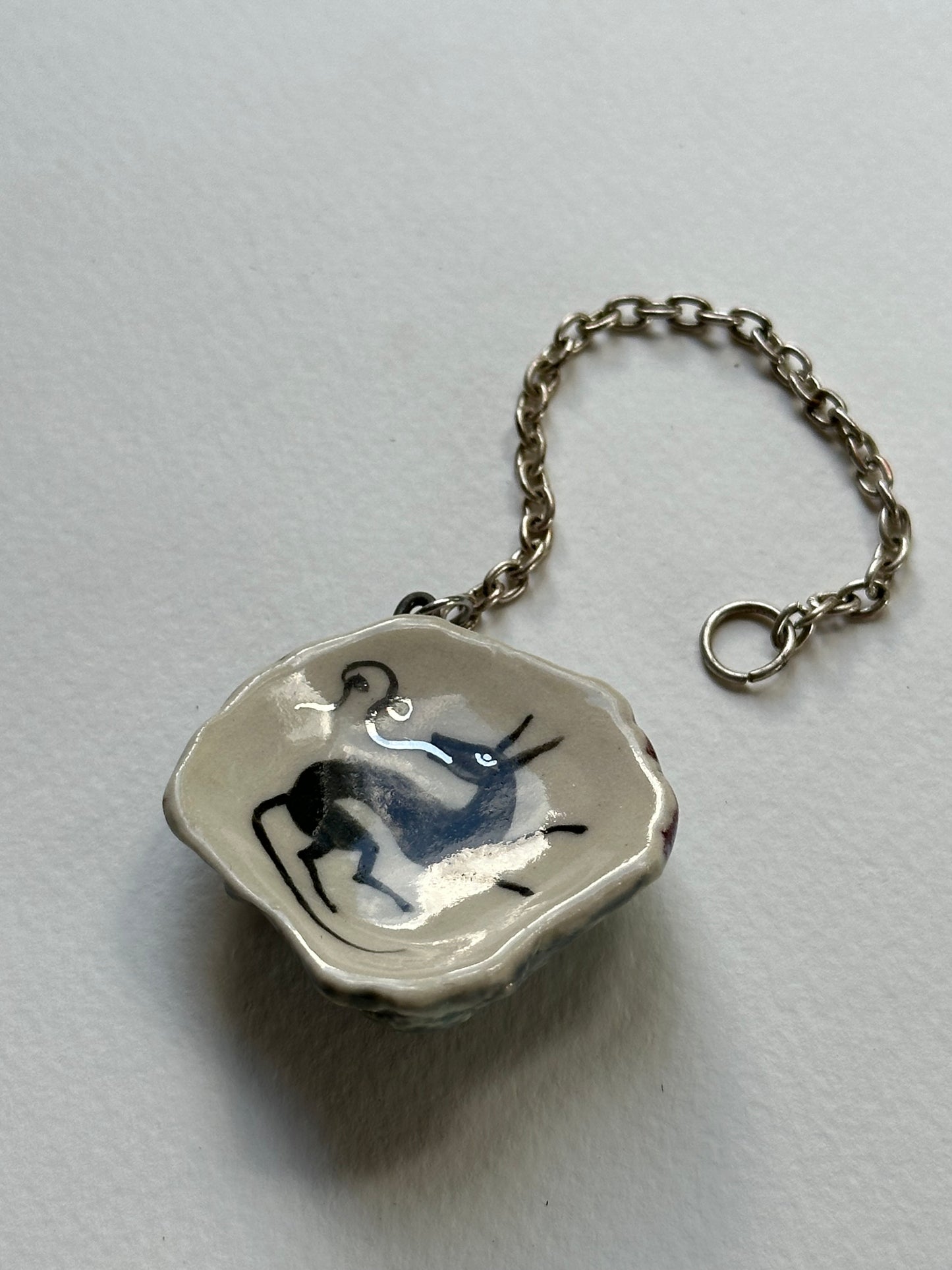 Wolf’s Breath - Shell Charm